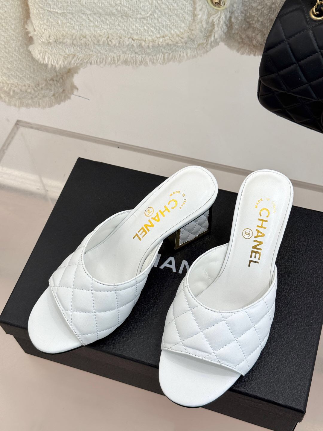 2025 Women Chanel White Lambskin Quilted Heeled Slippers